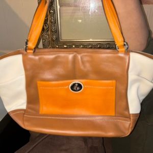 Orange and white coach purse